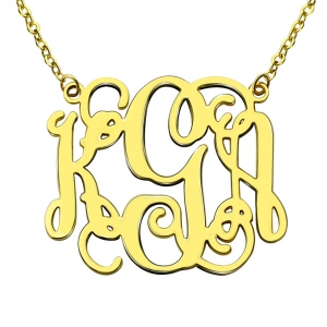 Collar con monograma recortado de Taylor Swift chapado en oro de 18 quilates